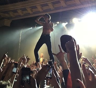 Lead singer Matt Shultz jumps into the crowd during Come a Little Closer.
